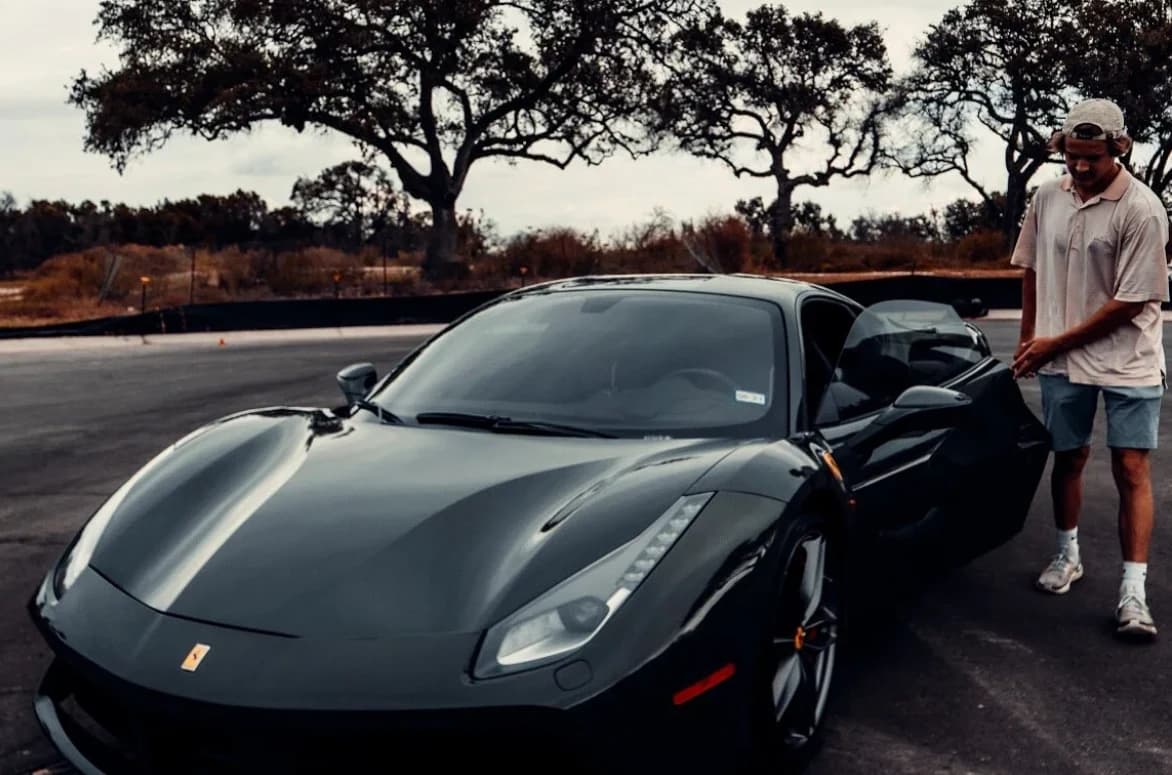 Jonah Warner with a freshly detailed Ferrari